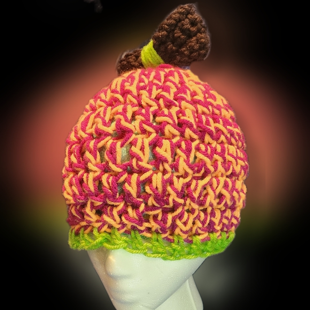 Cute women's beanie with a bow as a pompom